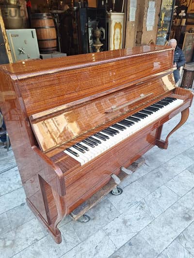 piano with. Steinmann Germany like new tuning warranty