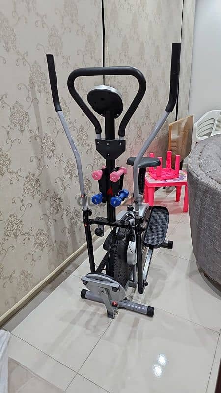 Eleptical bike with dumbells and Twister USED like new 150$ 2