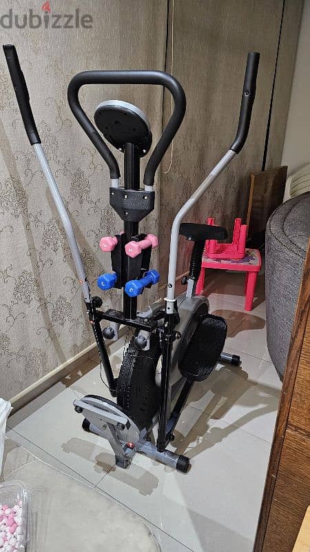 Eleptical bike with dumbells and Twister USED like new 150$ 3