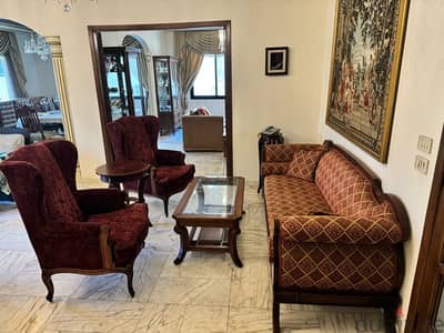 Elegant Sofa Set with Tables and Wall Tapestry for Sale