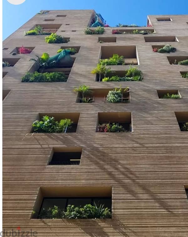 Conceptual high ceiling bld with large garden roof top and shops 3