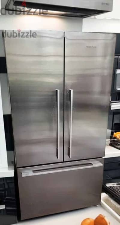 براد fisher and paykel 32 قدم بحالة جيدة جدا قابل للتفاوض