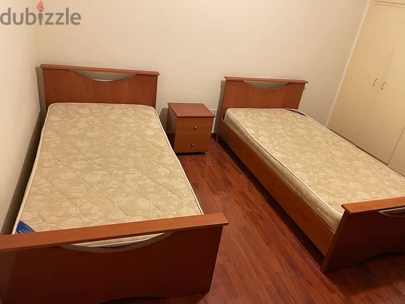 2 single beds+mattresses+bed side+ library shelves 1