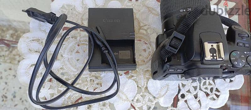 camera Canon 250d جديدة ونظيفة من الشركة+tripod+charge+bag 3