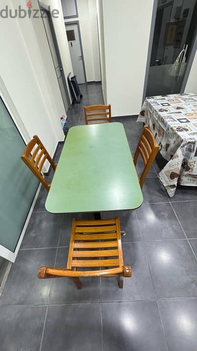 2 tables with chairs for sale