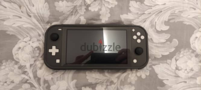 Nintendo Switch Lite, over 100$ in games included