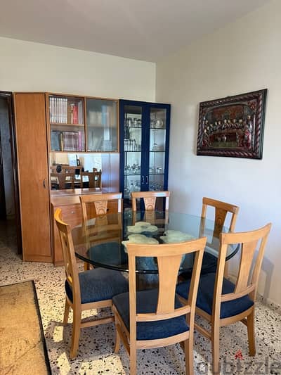 Dining Room table + 6 chairs + storage cabinets