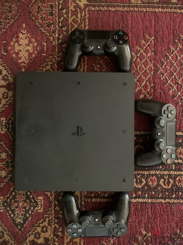 ps4 slim 1tb with 3 original controllers 1