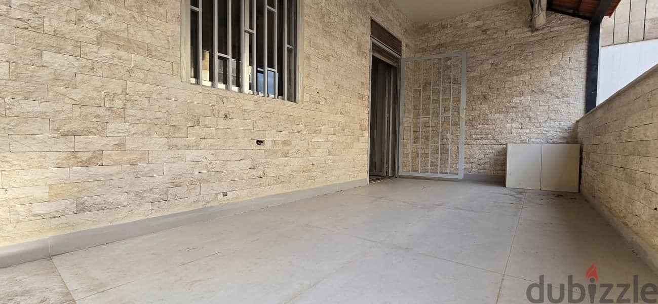 Renovated apartment in Ballouneh with 15 sqm Terrace 0