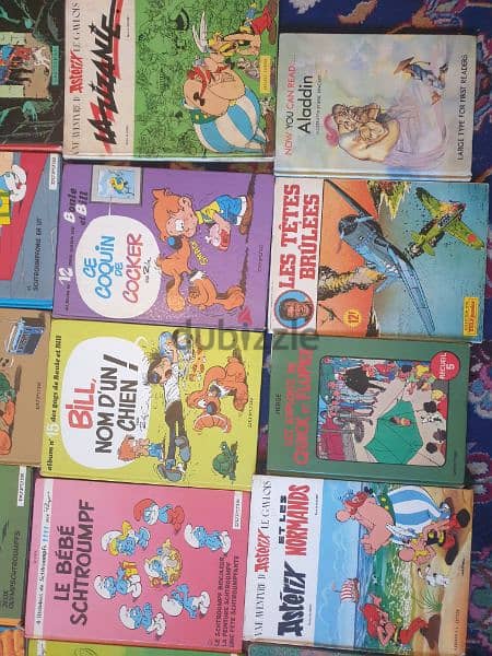 31 livres bandes dessinees,tintin,spirou,asterix, schtroumph,boule bil 1