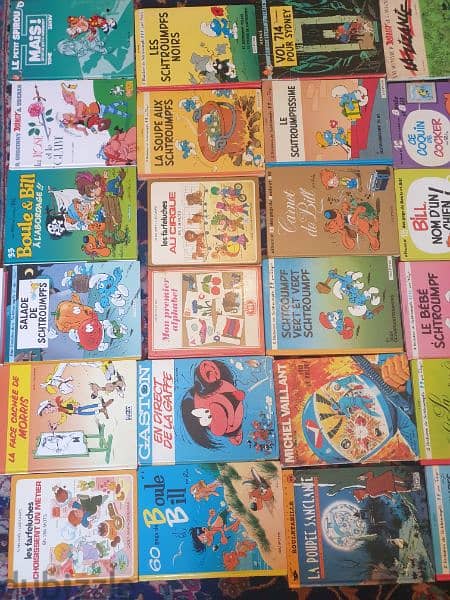 31 livres bandes dessinees,tintin,spirou,asterix, schtroumph,boule bil 2