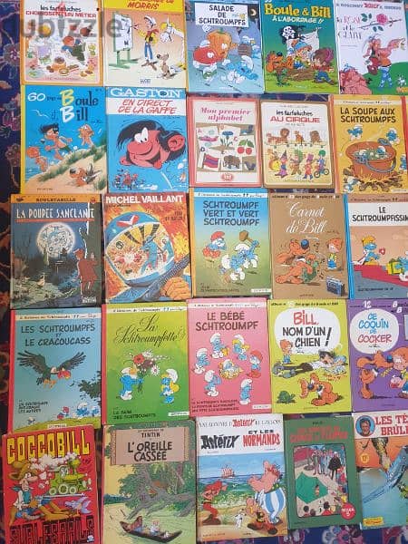 31 livres bandes dessinees,tintin,spirou,asterix, schtroumph,boule bil 4