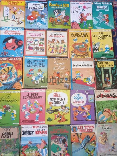 31 livres bandes dessinees,tintin,spirou,asterix, schtroumph,boule bil 5