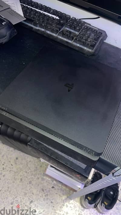 ps4 slim & 6 games & 2 joysticks