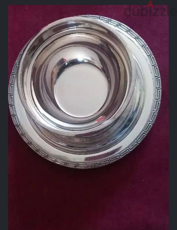 silver cups and their plates 0