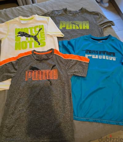 4 sports Tshirts size 10 to 12