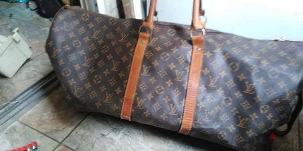 شنطه Louise vuitton كبيره اصليه