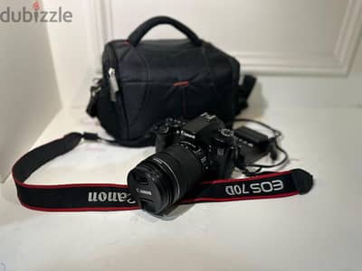 Canon 70D with lens 18-135 and a bag