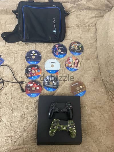 ps4 with 2 original controller with 9 cd included fc25 and gta 5