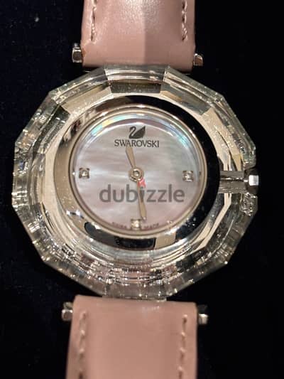 Swarovski pink round watch