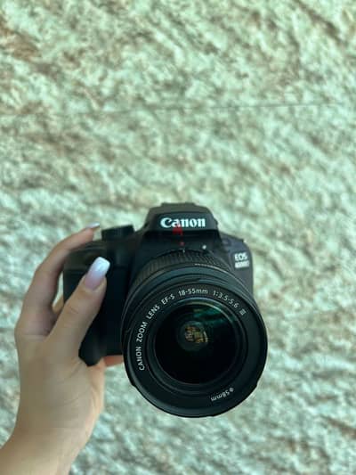 Canon EOS 4000D + zoom lens EF-S-18 55mm