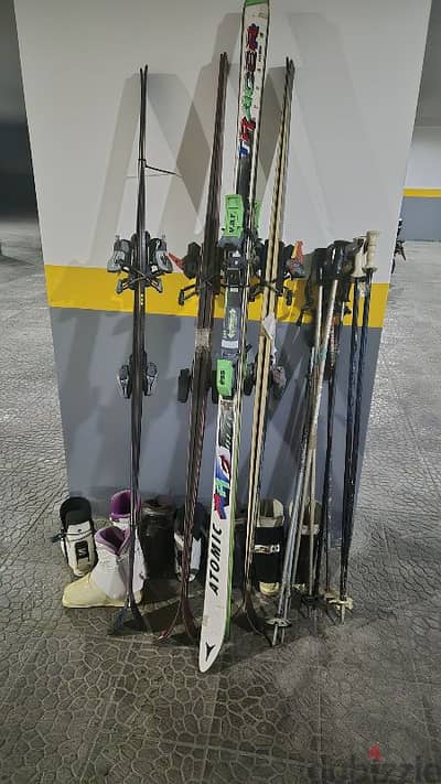 4 Skis with boots used