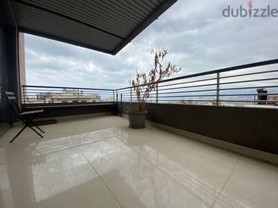 Furnished modern apartment for sale with open views in Achrafieh.