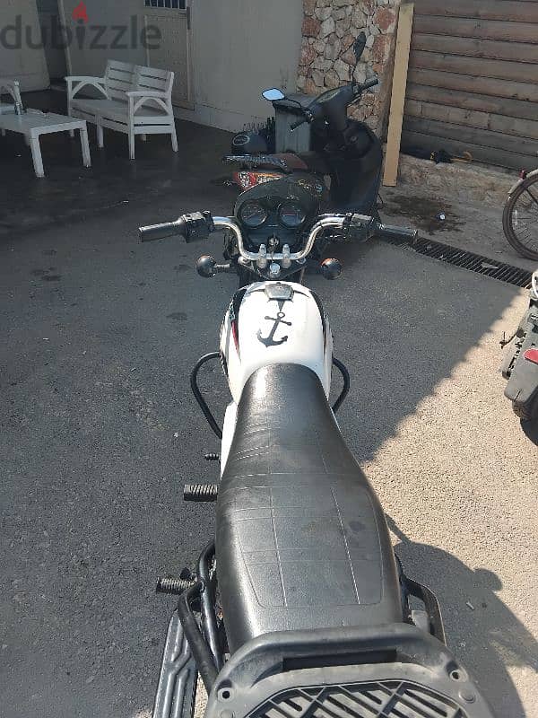 moto boxer bjaj 5