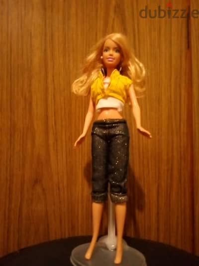 Barbie Mattel as new doll from Years 2000ish bend legs wearing=21$