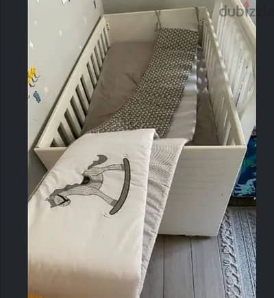 baby crib with mattress and cover