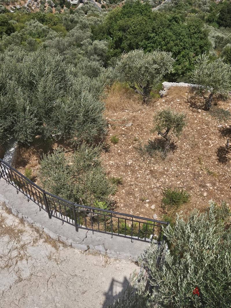 Land with a Stone House for sale in Batroun - أرض مع منزل حجري للبيع ف 7