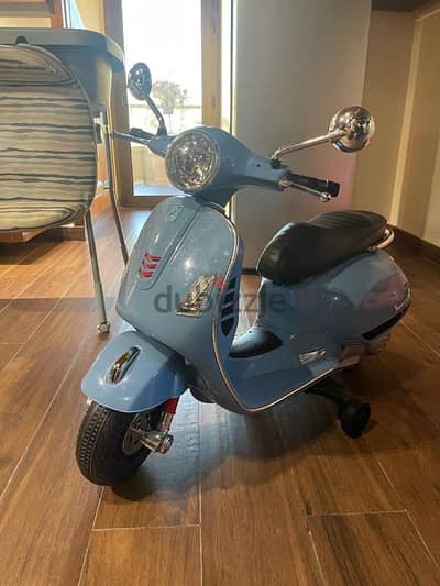 Vespa motorbike baby blue