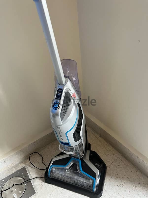 Vaccuum, wet and dru cordless bissel 1