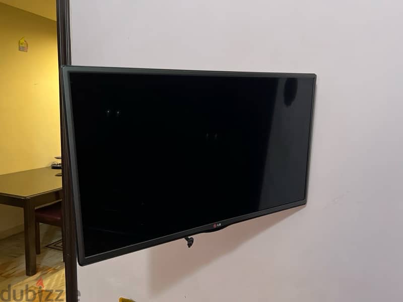 TV with the base for the wall 2