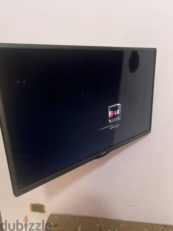 TV with the base for the wall 4