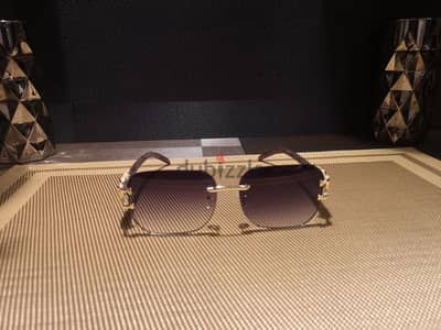 Panthère de Cartier sunglasses, rimless, luxurious