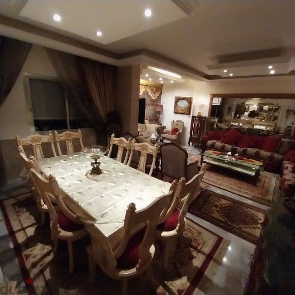 A full  dining room BRAND NEW.    a closet and a set of 8 chairs 2