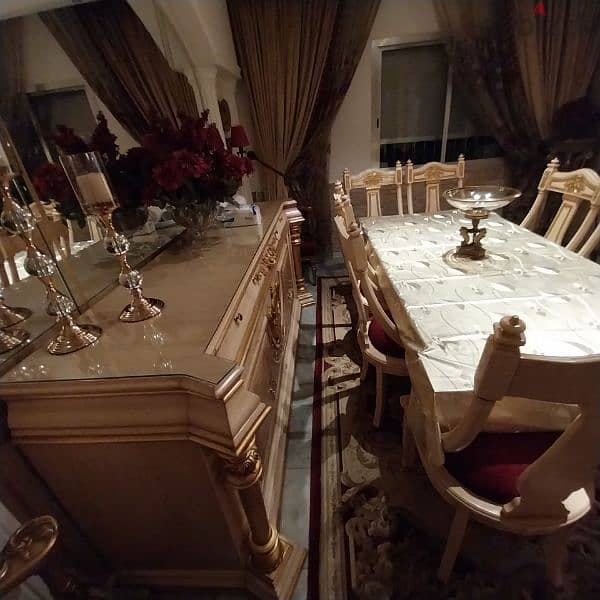 A full  dining room BRAND NEW.    a closet and a set of 8 chairs 7