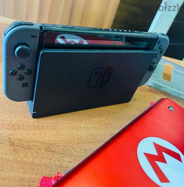 Nintendo switch with accessories 1