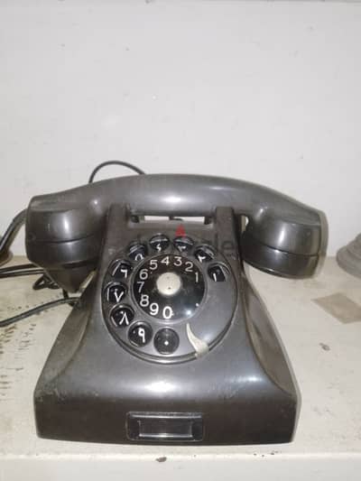 antique telephone Ericson working. year 60