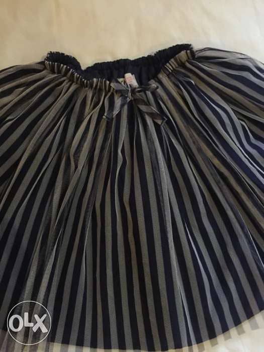 Nice skirt from H and M store Size 7-8Y 3