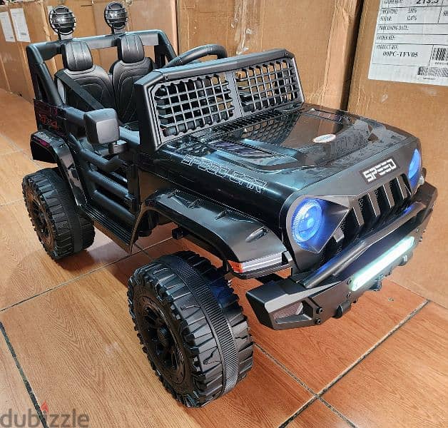 jeep wrangler 12volt ride on black motors. 2 battery. remote control. 1