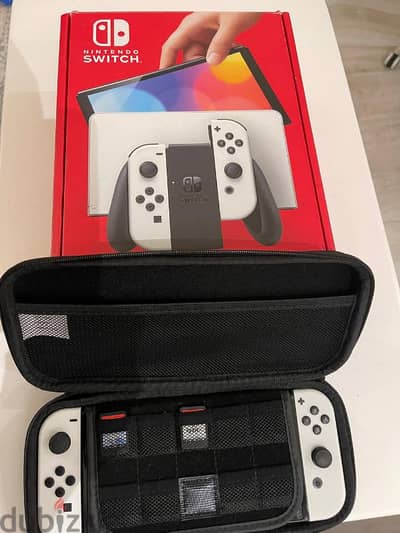 Nintendo Switch OLED + 3 games