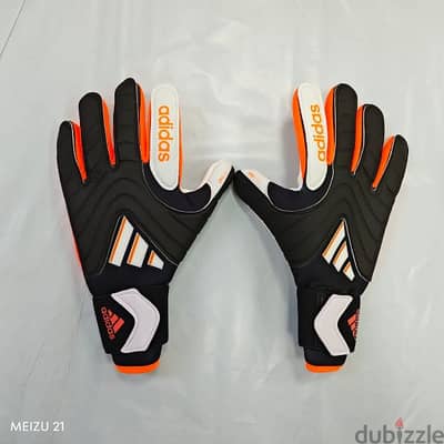 football shoes and goalkeeper gloves original