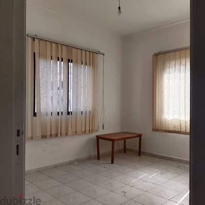 Office for rent in Ballouneh main road.