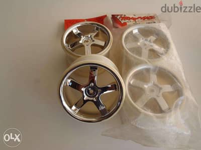 exchange on rc car ,TRAXXAS,CHROME RIMS,hurrican,3.8 inches