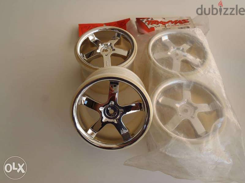 rc car ,TRAXXAS , CHROME RIMS , hurricane , 3.8 inches , set of 4 rims 0