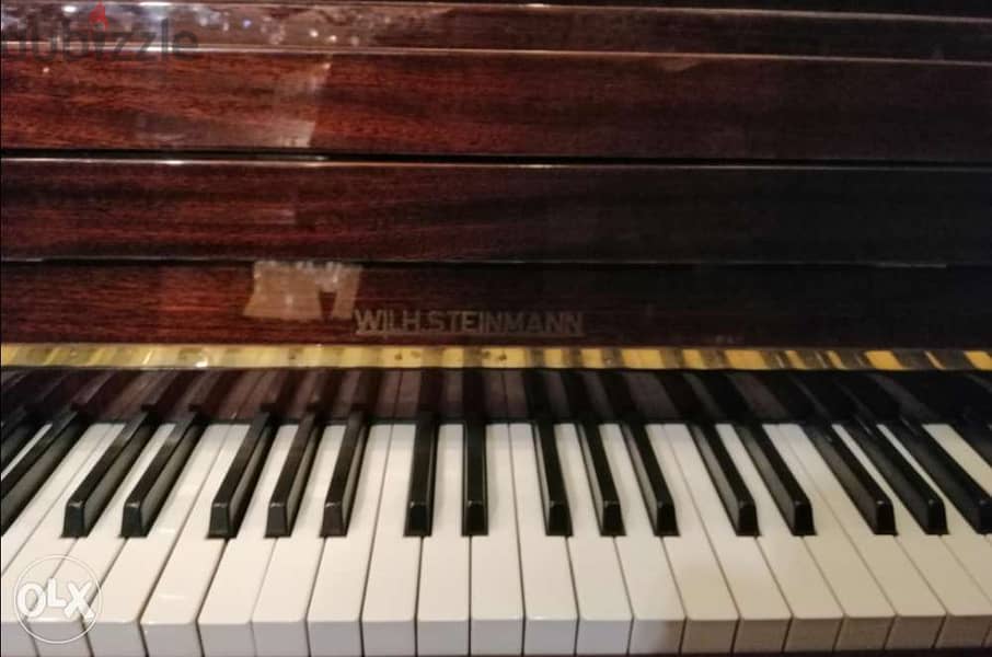 من روائع البيانوات خارق النظافة مكفول صنع ألماني لون موغانو شركة piano 1
