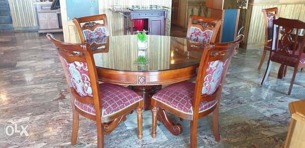 Dining Table with glass top plus 6 chairs, feel brand new!