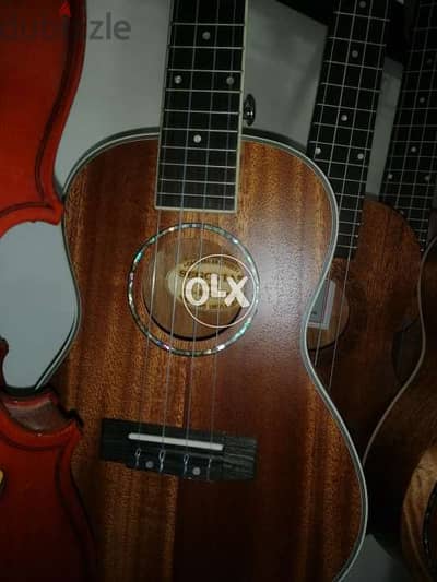 Ukulele 23" with bag free starting price